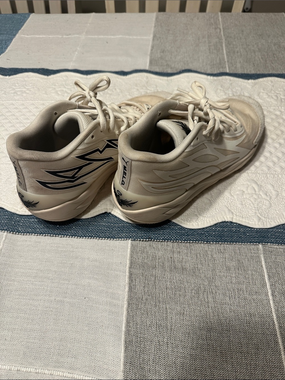 Puma M.E.L.O. Carmelo Anthony Off-White Low-Top Sneakers with Black Logo.